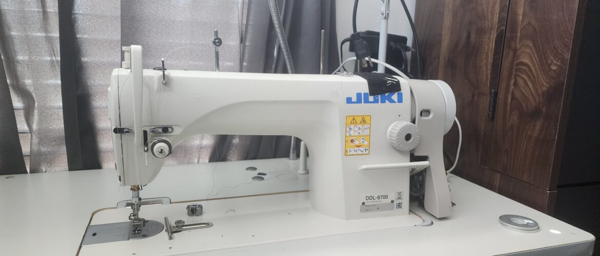 A Juki DDL-8700 industrial sewing machine, the technical foundation for the Academy of Sewing's tailored construction tutorials.